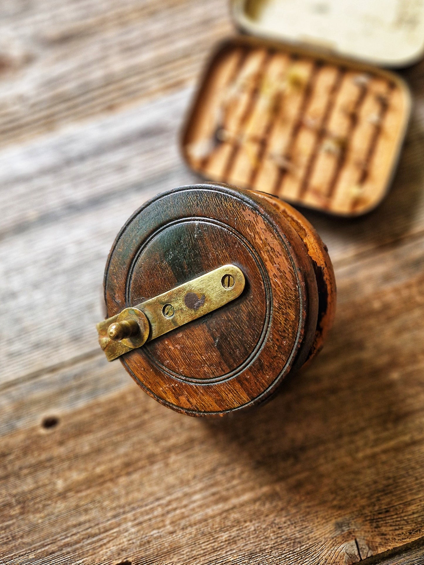 Well-Preserved 3-7/8-inch Nottingham-Style Fishing Reel | Vintage Wood & Brass Reel from Early 1900s