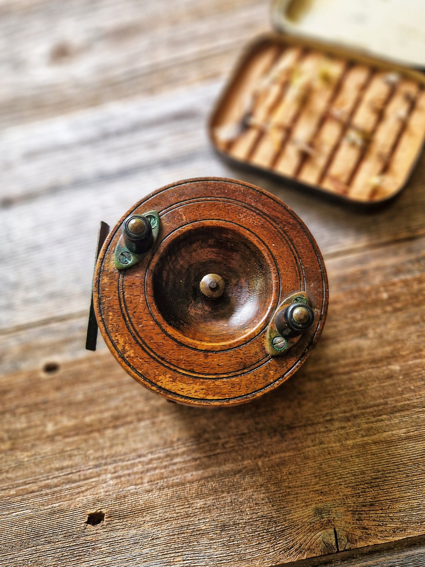Well-Preserved 3-7/8-inch Nottingham-Style Fishing Reel | Vintage Wood & Brass Reel from Early 1900s