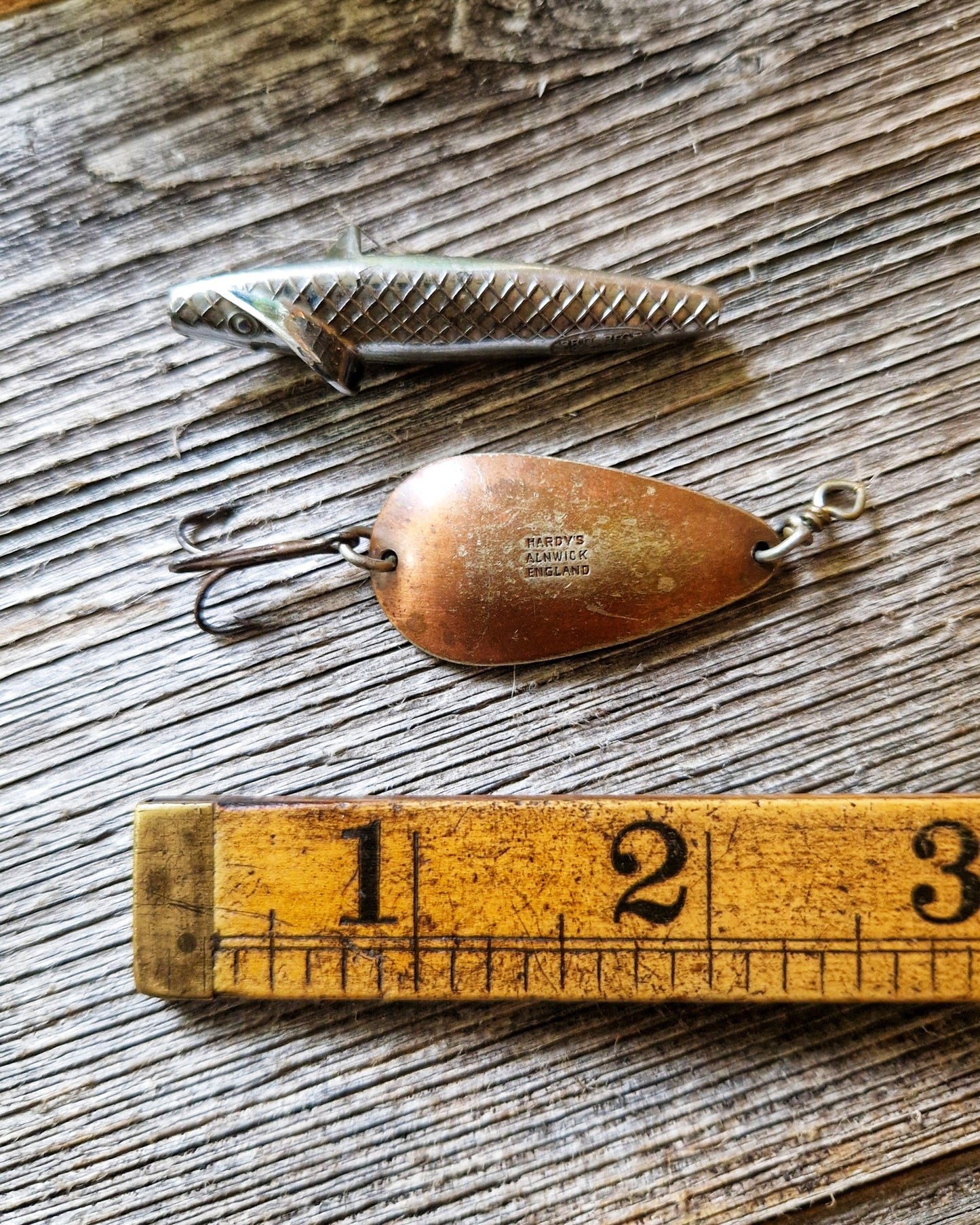 8 Vintage Fishing Lures including Hardy Bros, Mepps | Angling Collectibles in Original Tobacco Tin, c. 1930-1950